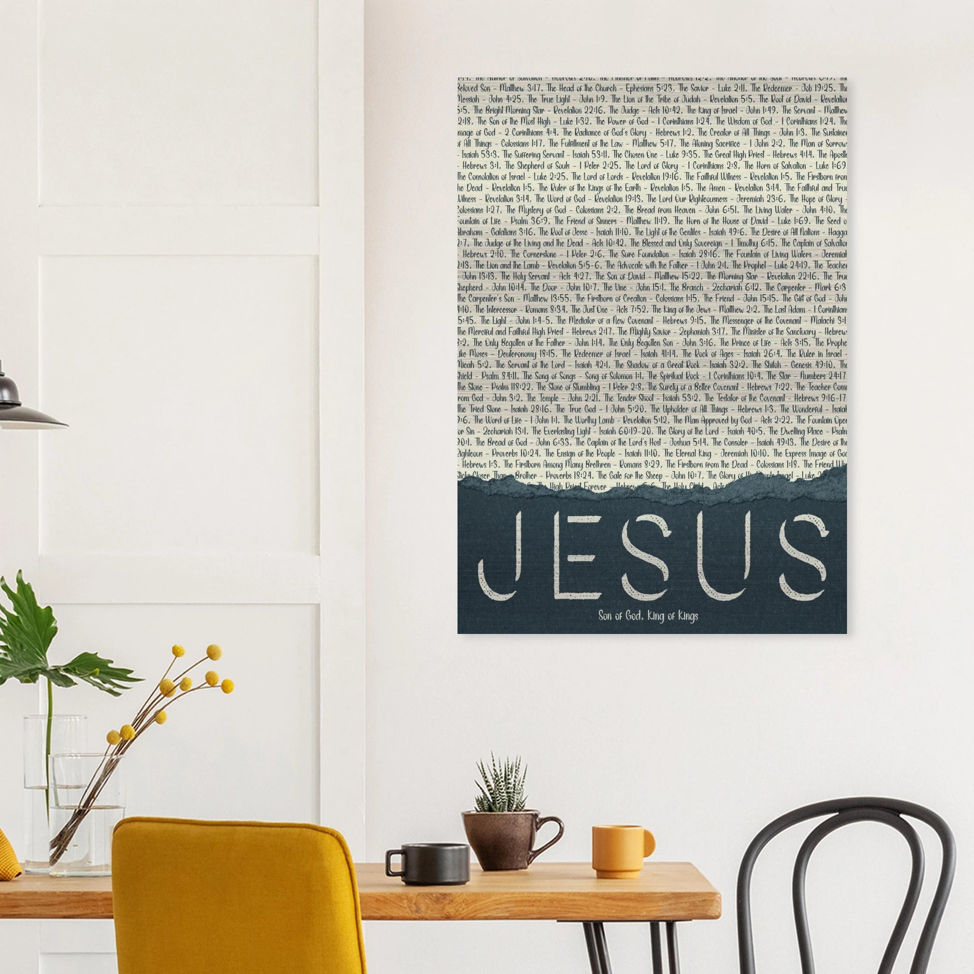 jesus metal wall art featuring scripture titles shown above a yellow chair in a bright minimalist room