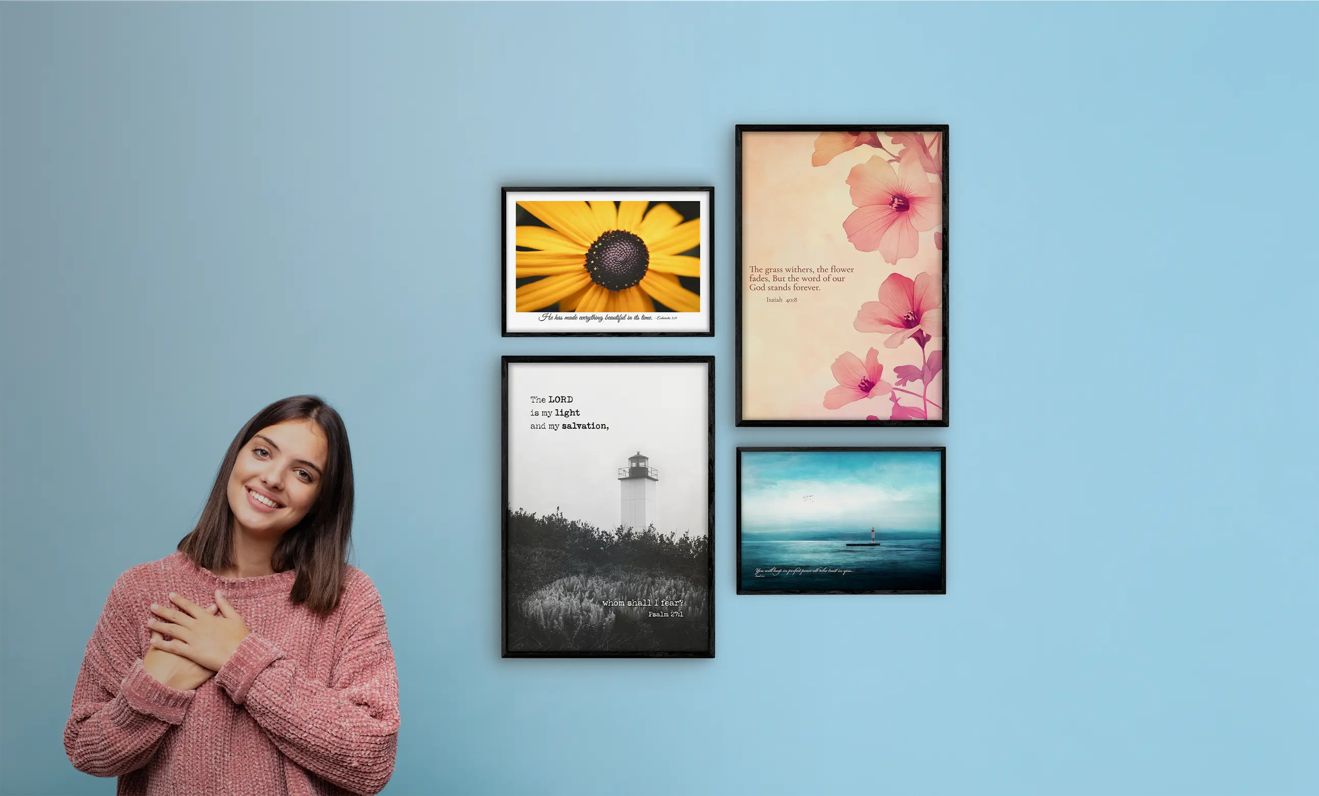 Woman standing in front of a wall with four framed artworks on a blue background