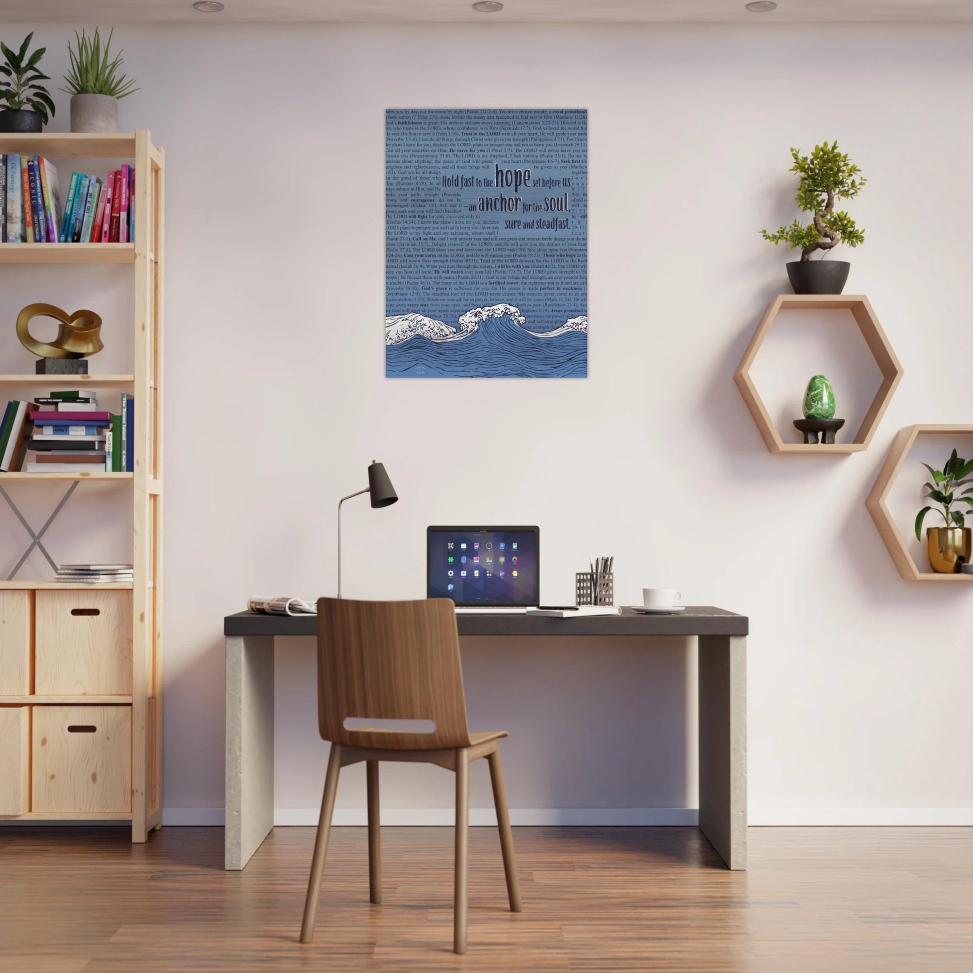 metal wall art featuring a wave and anchor design with bible verses in pink and silver tones displayed above a modern home office desk