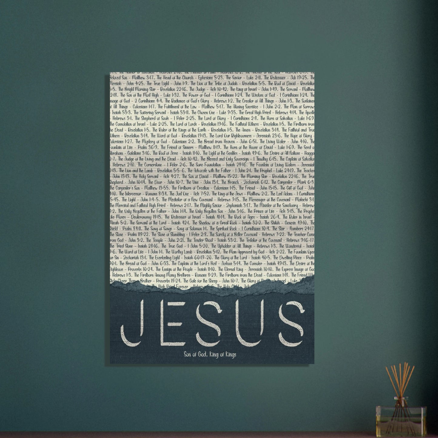 jesus metal wall art with scriptural titles shown on a dark teal wall in a modern room