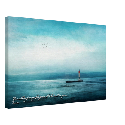 A canvas wall art print featuring a lighthouse with a backdrop of the sea and sky, including a quote about perfect peace.