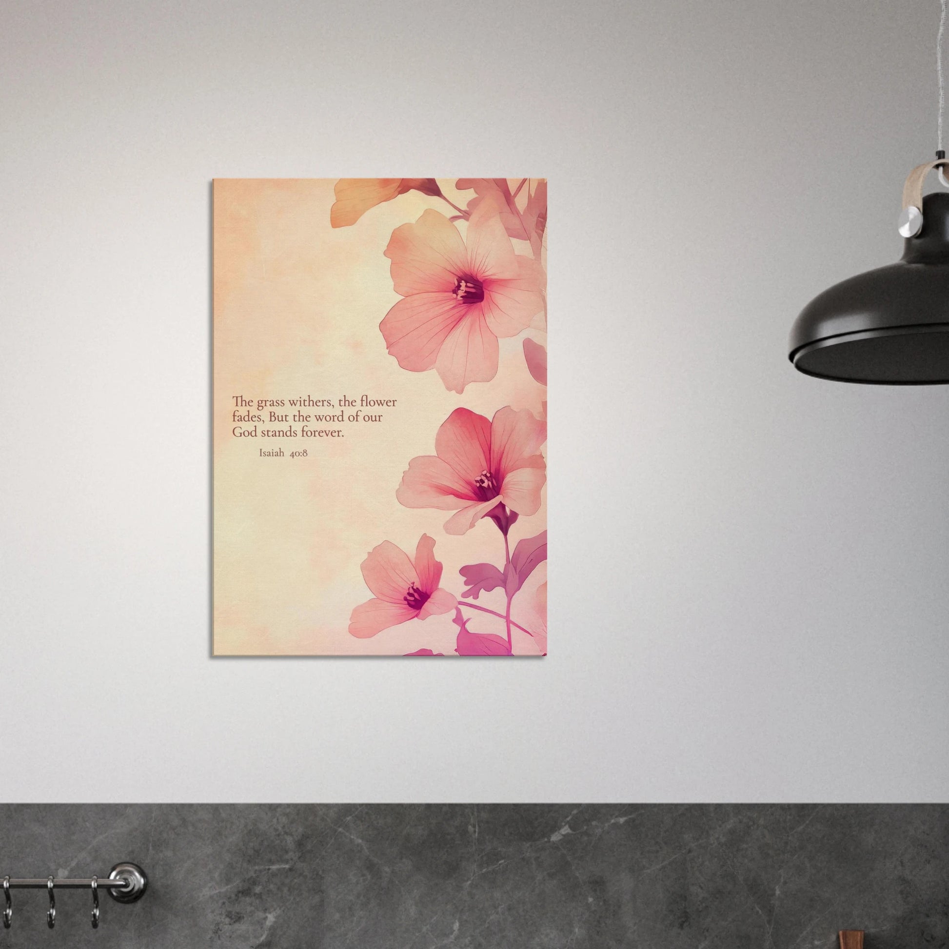 wall art print featuring floral design with pink flowers and the text of Isaiah 40:8 scripture, titled 'The Word of God Stands Forever' hanging in a modern minimalist kitchen wall