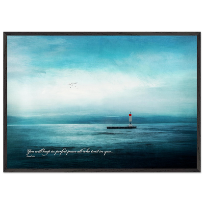 A framed poster featuring a lighthouse in a serene seascape with the text 'You will keep in perfect peace all who trust in you.' from Isaiah 26:3.