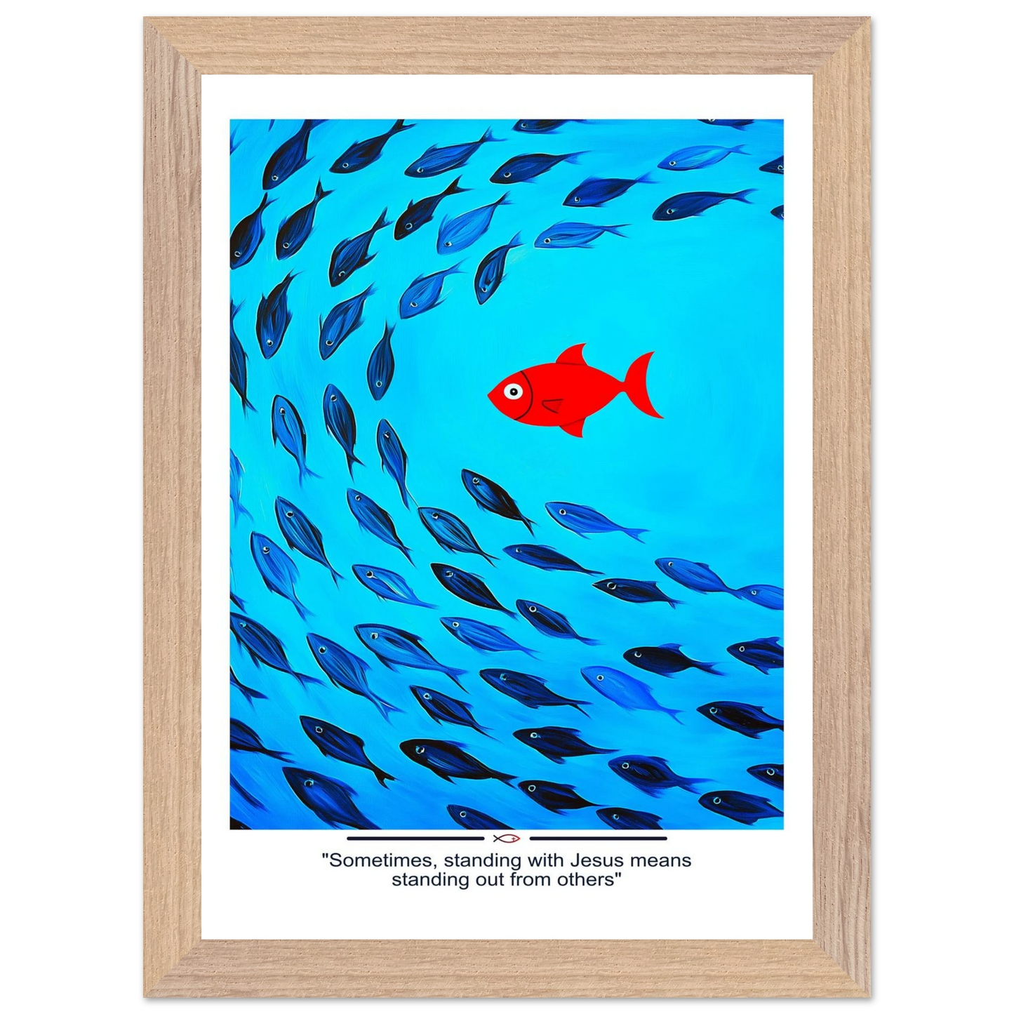 Framed Christian wall art featuring a red fish swimming in water with blue fish, and the text 'Sometimes standing with Jesus means standing out from others' as a quote.