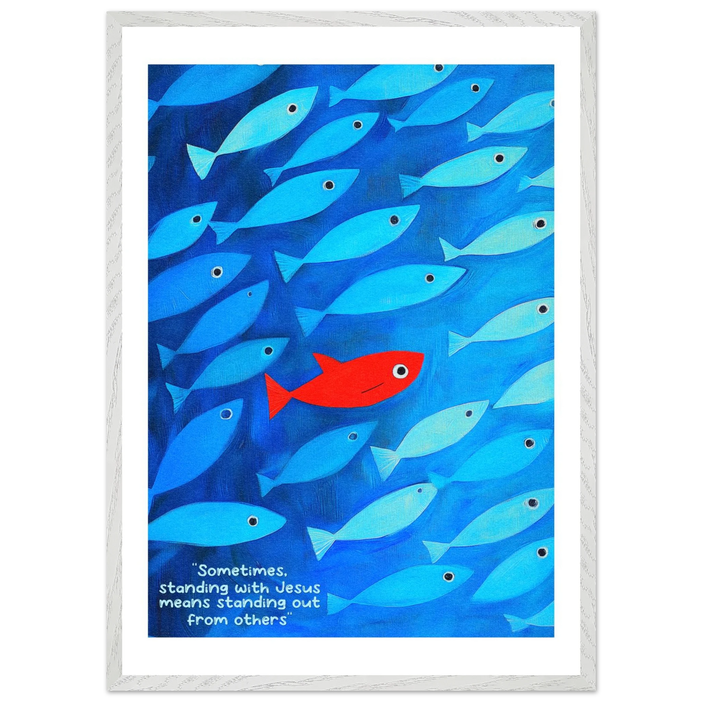 Framed wall art featuring a school of blue fish with a single red fish, and text that reads: 'Sometimes standing with Jesus means standing out from others.'.