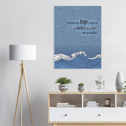Christian canvas artwork featuring waves and Hebrews 6:19 above a white dresser with plants