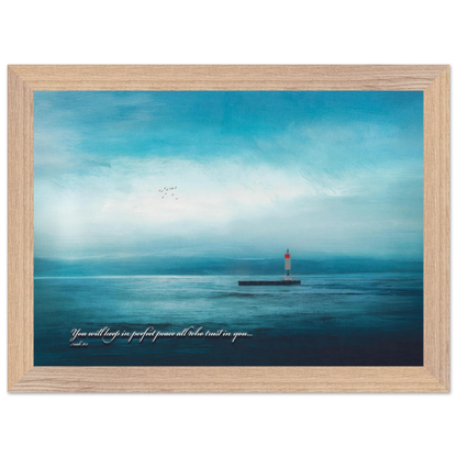 A framed poster featuring a lighthouse in a serene seascape with the text 'You will keep in perfect peace all who trust in you.' from Isaiah 26:3.