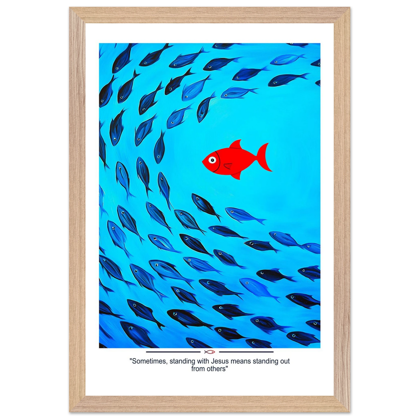 Framed Christian wall art featuring a red fish swimming in water with blue fish, and the text 'Sometimes standing with Jesus means standing out from others' as a quote.