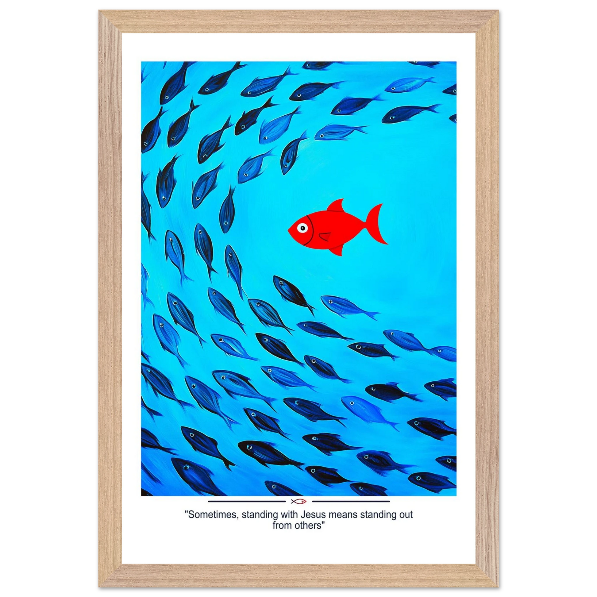 Framed Christian wall art featuring a red fish swimming in water with blue fish, and the text 'Sometimes standing with Jesus means standing out from others' as a quote.