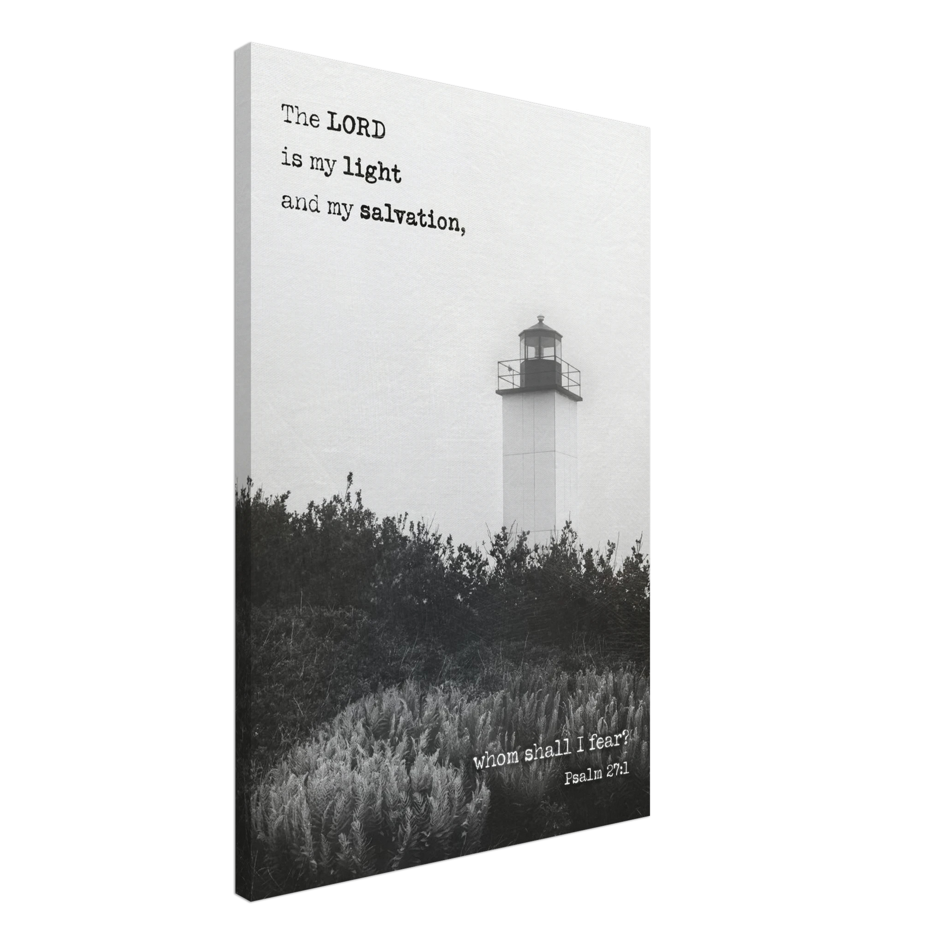 A canvas wall art print featuring a lighthouse with a black and white coastal landscape and the text of Psalm 27:1 which reads 'The Lord is my light and my salvation.'.