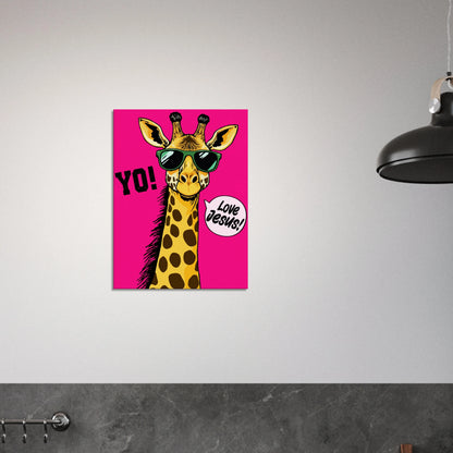 A vibrant pink poster featuring a cartoon giraffe with sunglasses and a speech bubble with the phrase 'Love Jesus!' The giraffe is the central figure against a vivid pink background displayed in a bright minimalist black and white kitchen