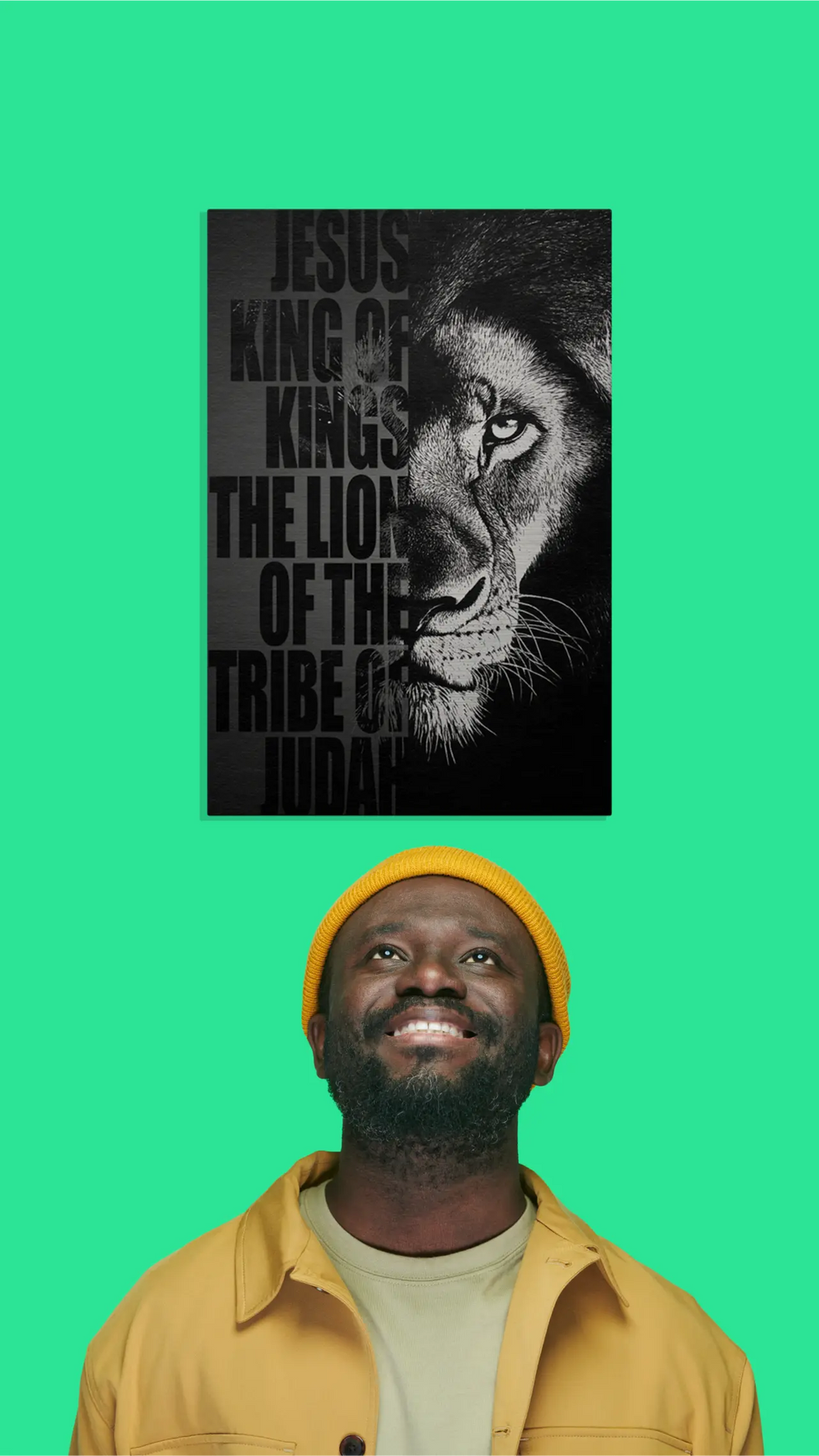 Man wearing a yellow beanie with a lion graphic and text on a green background