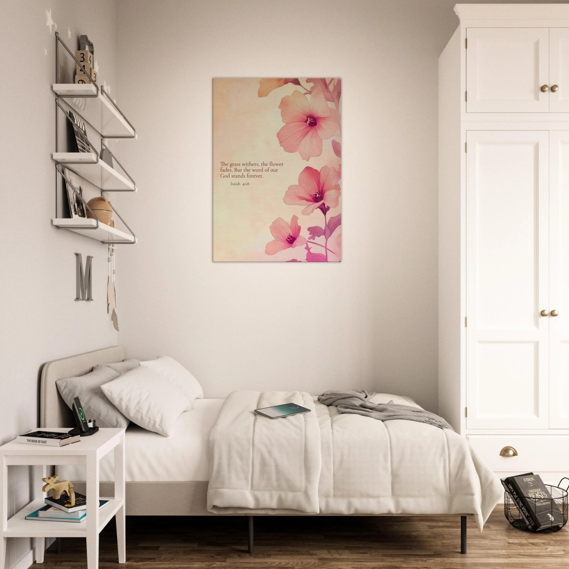 wall art print featuring floral design with pink flowers and the text of Isaiah 40:8 scripture, titled 'The Word of God Stands Forever' hanging over a modern minimalist bedroom