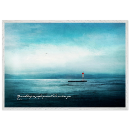 A framed poster featuring a lighthouse in a serene seascape with the text 'You will keep in perfect peace all who trust in you.' from Isaiah 26:3.