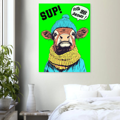 Colorful poster of a cow wearing a hat and scarf on a wall above a bed.