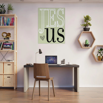 Modern home office with a desk, chair, and wall art displaying 'JESUS'.