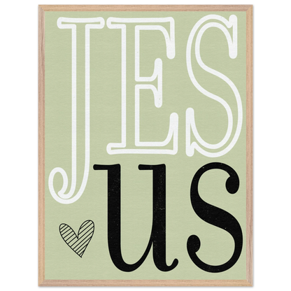 Decorative sign with 'JES US' text on a light green background