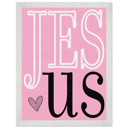 Pink blanket with 'JESUS' text and heart design on a white background
