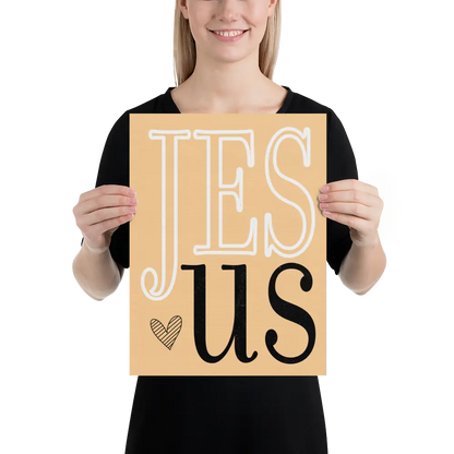 Person holding a sign with 'Jesus' on a white background