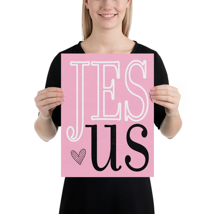 Person holding a pink sign with 'JESUS' text