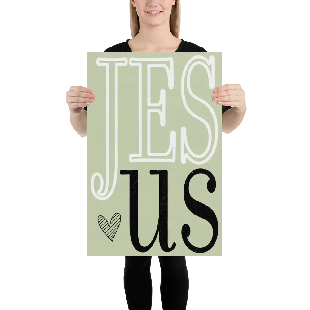Person holding a sign with 'JESUS' on a light green background
