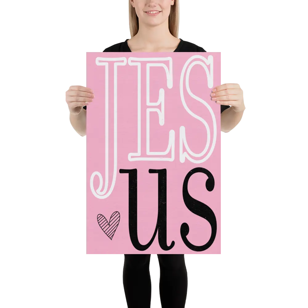 Person holding a pink sign with 'JESUS' text