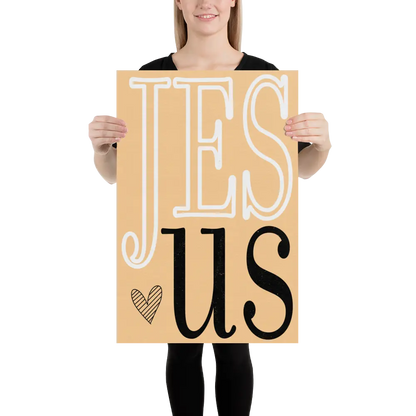 Person holding a cardboard sign with 'JESUS' text on a white background