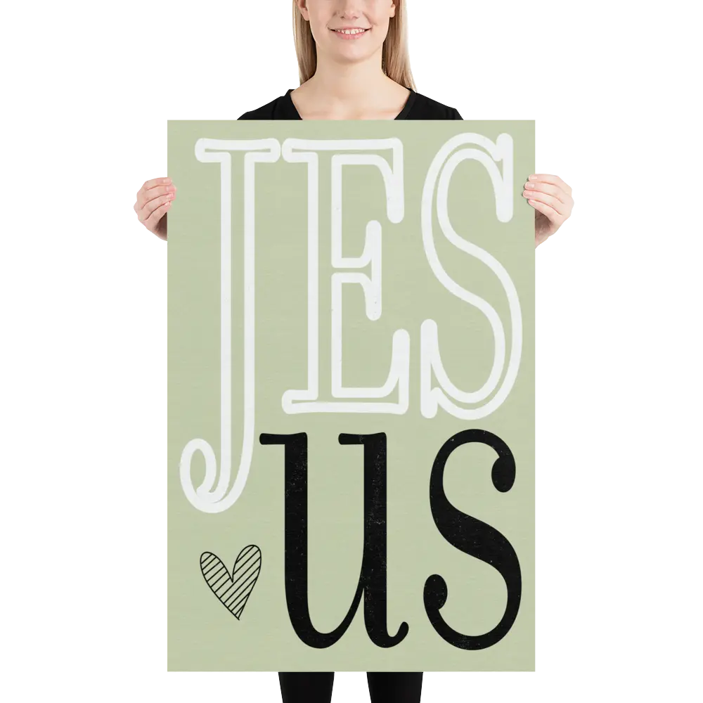 Person holding a sign with 'JESUS' text on a light green background