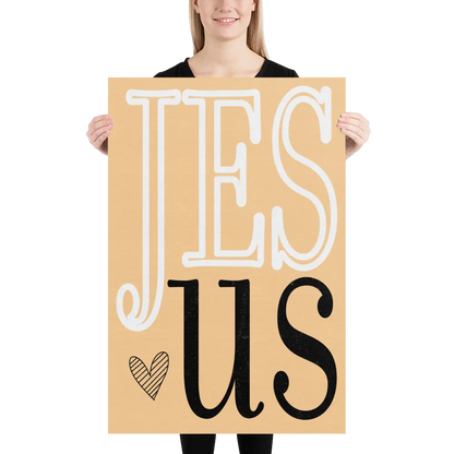 Person holding a cardboard sign with 'JESUS' text on a white background