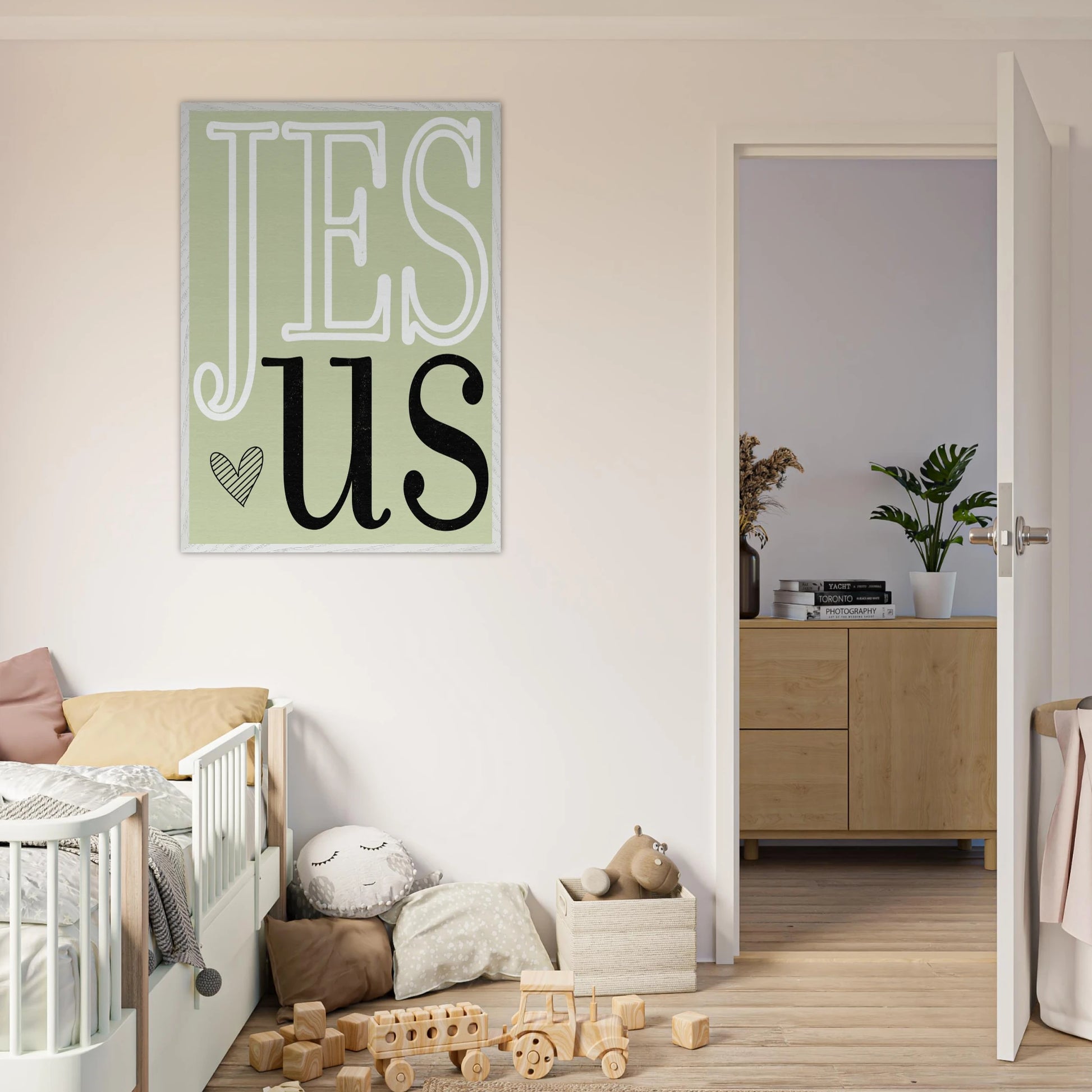 Children's room with 'JESUS' poster on the wall