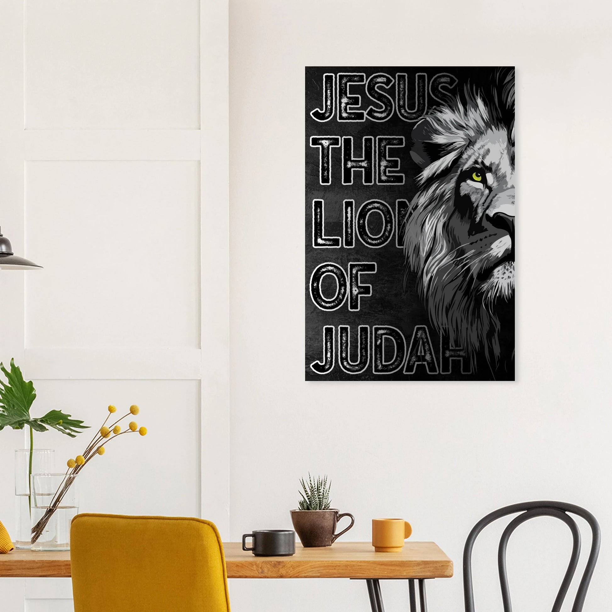 Poster with 'Jesus, The Lion of Judah' design on a wall above a table with decor items.