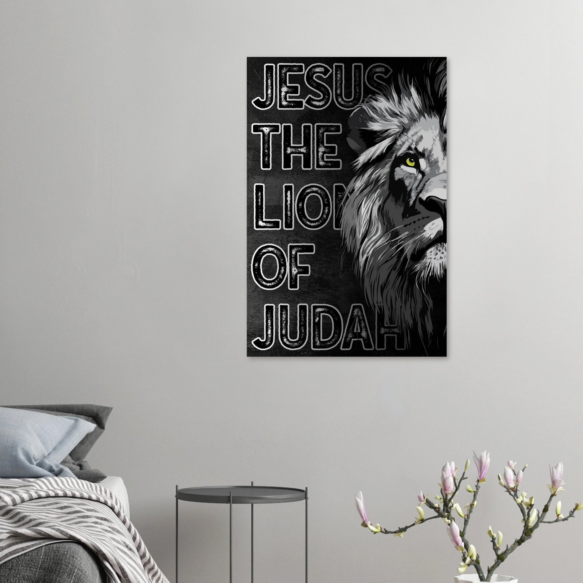 Canvas print with a lion and text 'Jesus The Lion of Judah' on a wall above a bed.