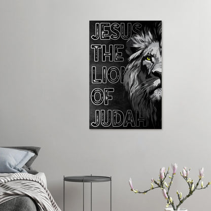 Canvas print with a lion and text 'Jesus The Lion of Judah' on a wall above a bed.