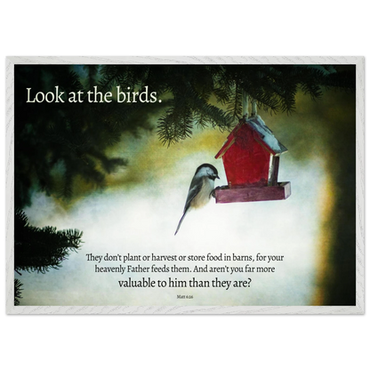 Red birdhouse with a bird on a misty background, featuring a motivational quote.