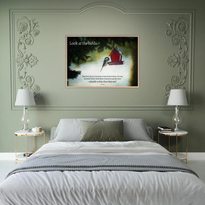 Bedroom with a framed picture of a birdhouse on the wall