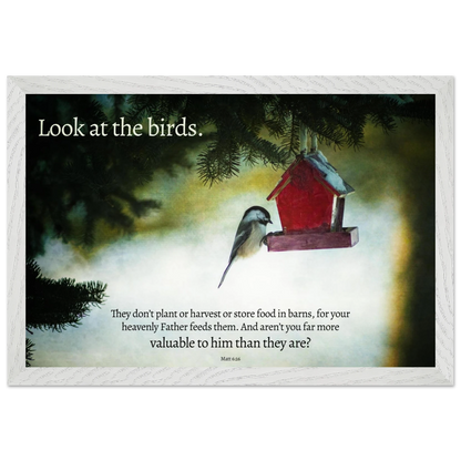 Framed artwork with a bird and birdhouse on a misty background, featuring a quote.