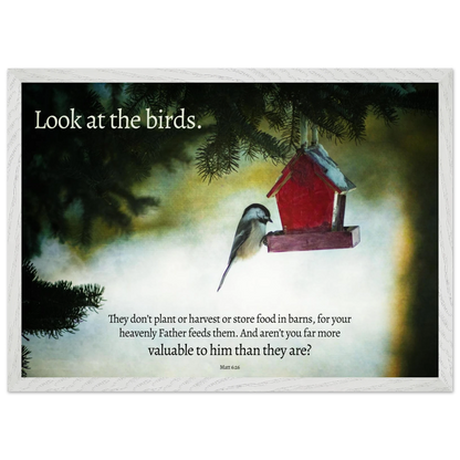 Red birdhouse with a bird on a snowy background, featuring a motivational quote.