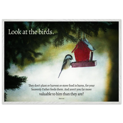 Red birdhouse with a bird on a snowy background, featuring a motivational quote.