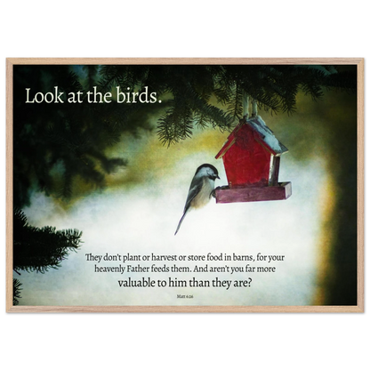 Framed artwork with a bird and birdhouse on a snowy background, featuring a motivational quote.