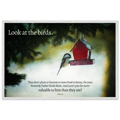 Red birdhouse with a bird on a misty background, featuring a quote.