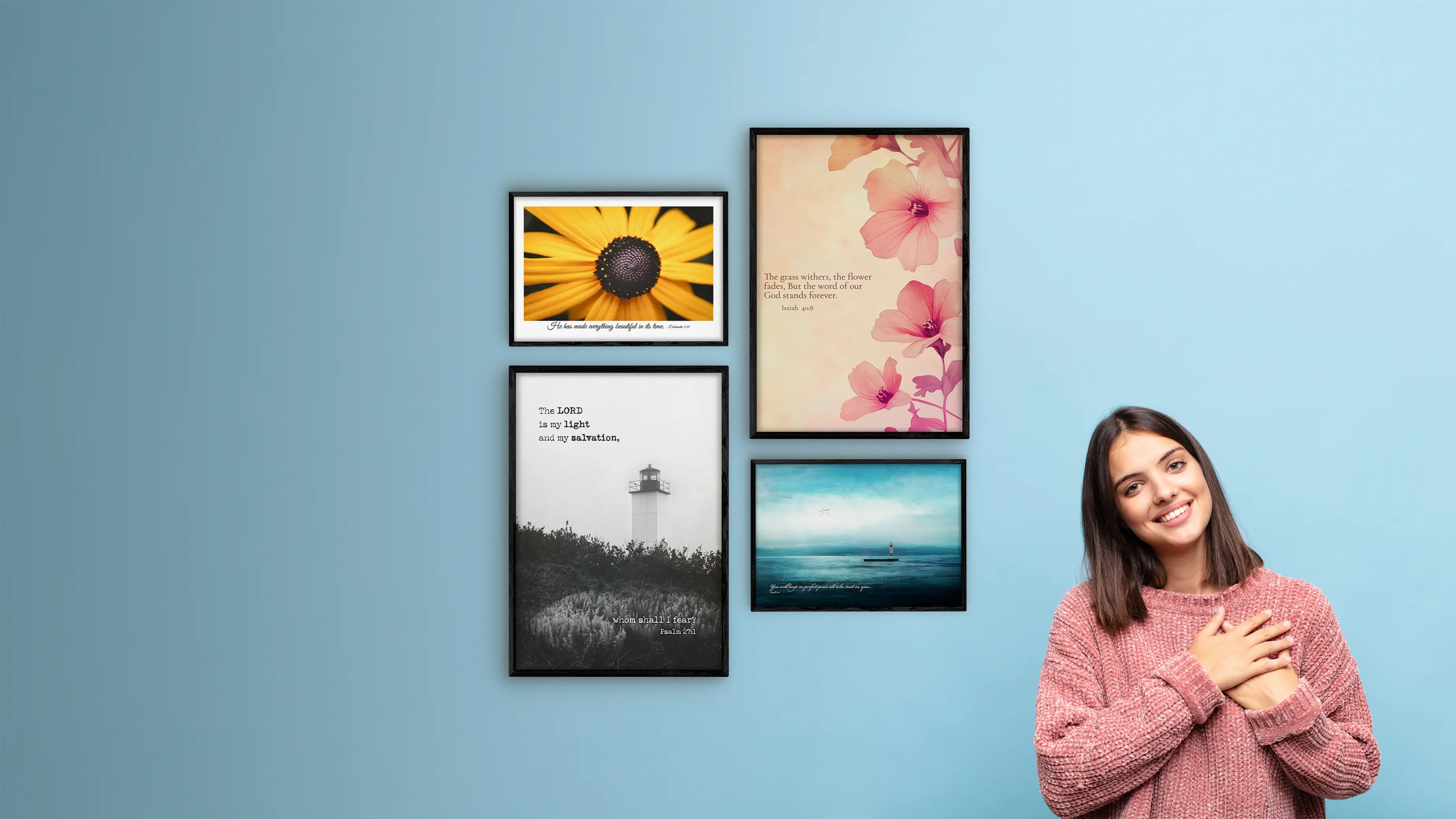 Woman standing next to a wall with framed pictures on a blue background