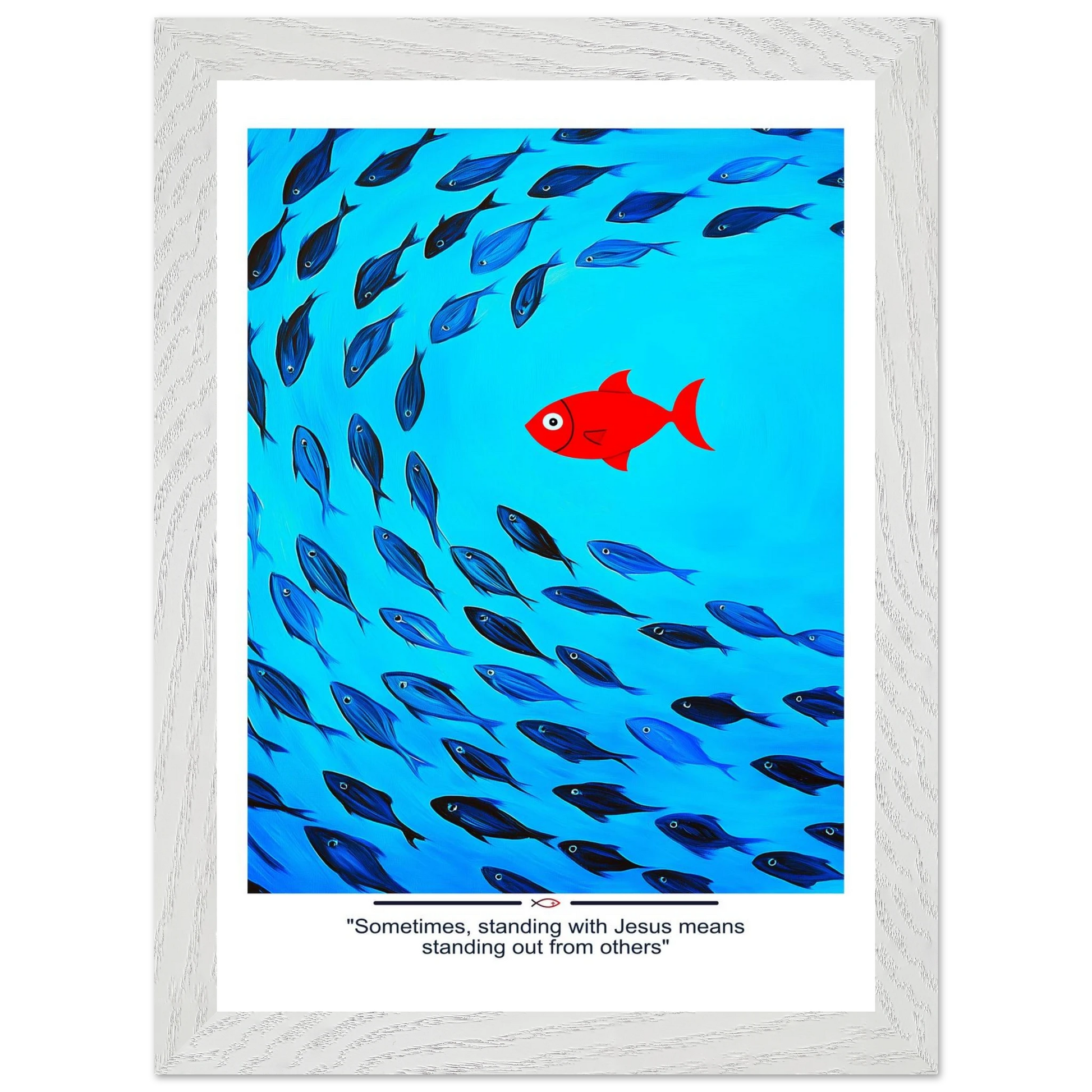 Framed Christian wall art featuring a red fish swimming in water with blue fish, and the text 'Sometimes standing with Jesus means standing out from others' as a quote.