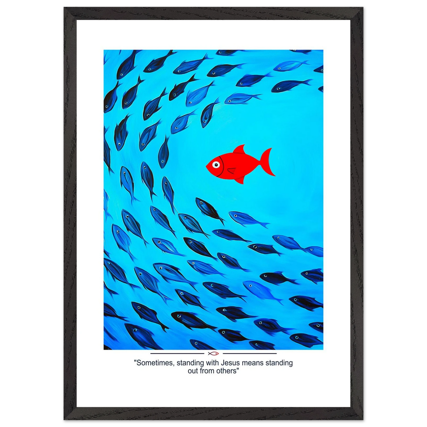 Framed Christian wall art featuring a red fish swimming in water with blue fish, and the text 'Sometimes standing with Jesus means standing out from others' as a quote.