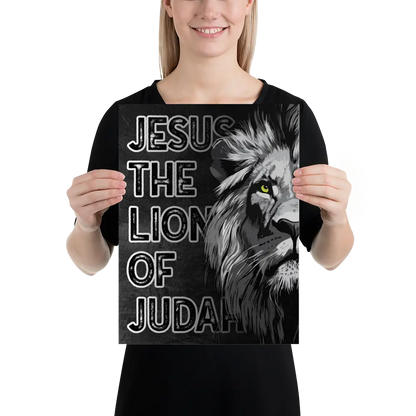 Person holding a black t-shirt with a lion graphic and text.