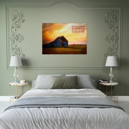 Bedroom with a painting of a barn on a sunset background above a bed.