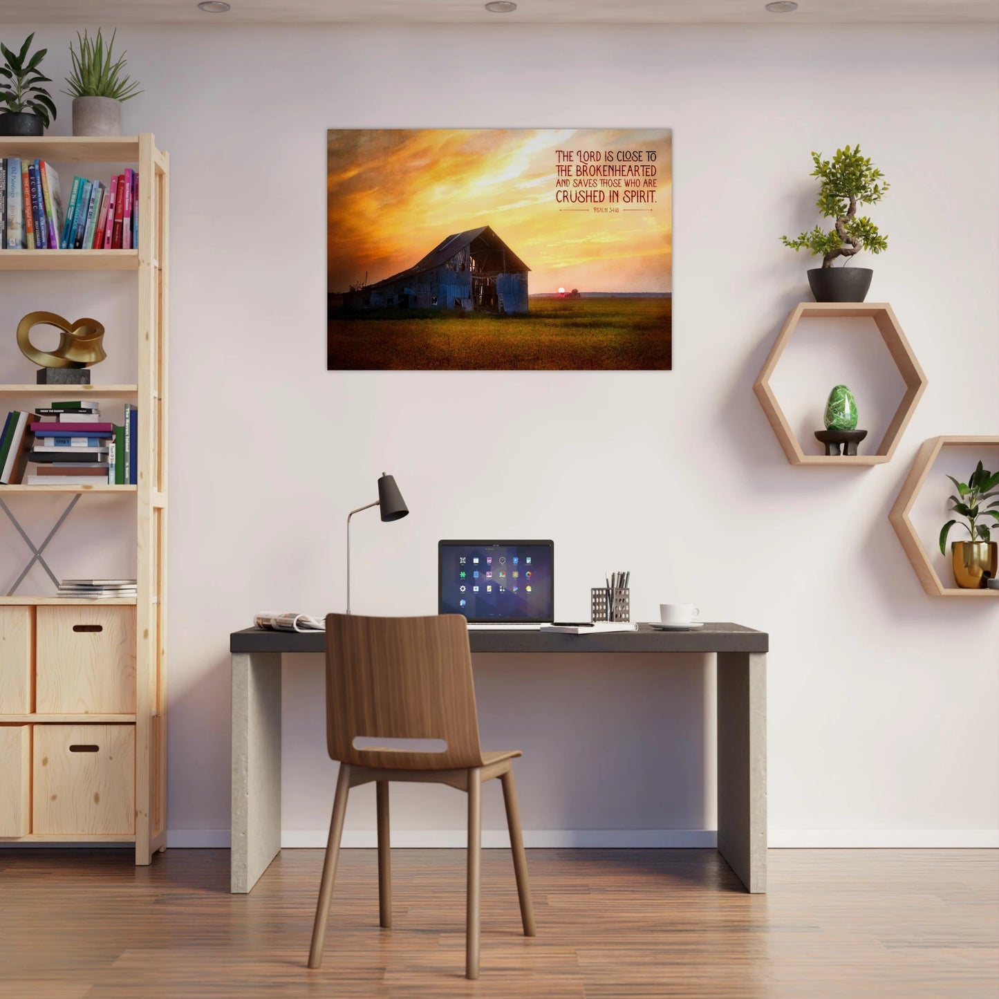 Home office with a desk, chair, laptop, and decorative elements.