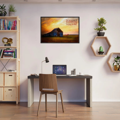 Modern home office with a desk, chair, and wall art