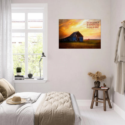 Bedroom with a sunset over a mountain scene on the wall