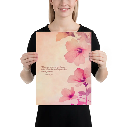 Person holding a floral print with a quote on a white background