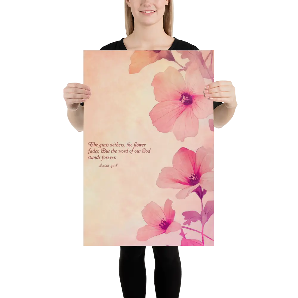 Person holding a large floral poster with pink flowers and text.